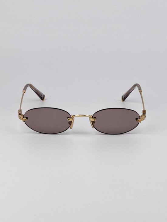 Miu Miu Women’s Sunglasses Pale Gold Gradient Pink Oval Frames MUA54S ZVN70O main image 9